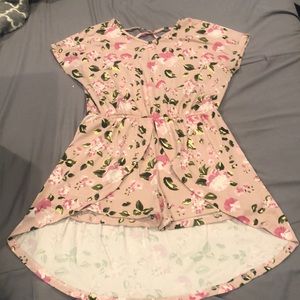 I am selling a pink medium sized romper dress